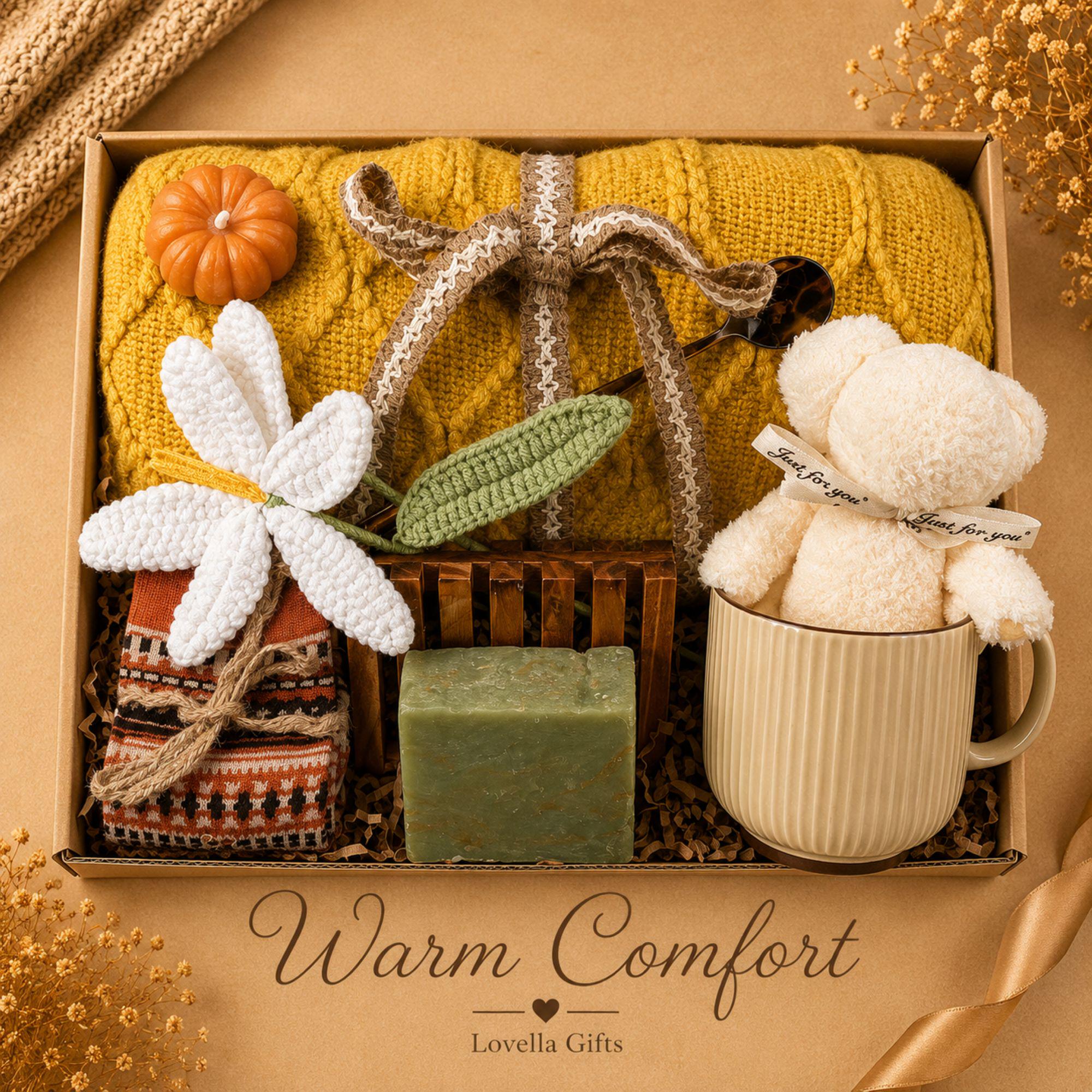 Thanksgiving gift box for women featuring a cozy knit blanket, handmade pumpkin soy candle, ceramic mug, artisan soap, decorative glass match bottle, plush teddy bear and cozy autumn socks in boutique gift packaging. Thanksgiving hostess gift basket perfect for hostess appreciation, thank you gifts, fall care packages, cozy blanket gifts, autumn self care, holiday gatherings, and seasonal gifts for mom, grandma, sister, friend, teacher or coworker.