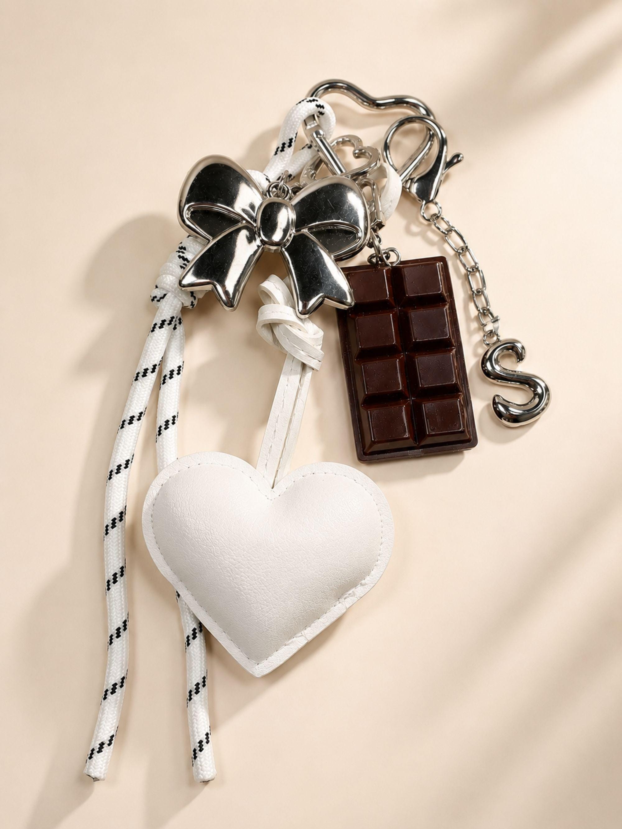 Personalized Bag Charm heart purse charm with bow keychain, initial charm, coquette handbag accessory, and cute gift styling.