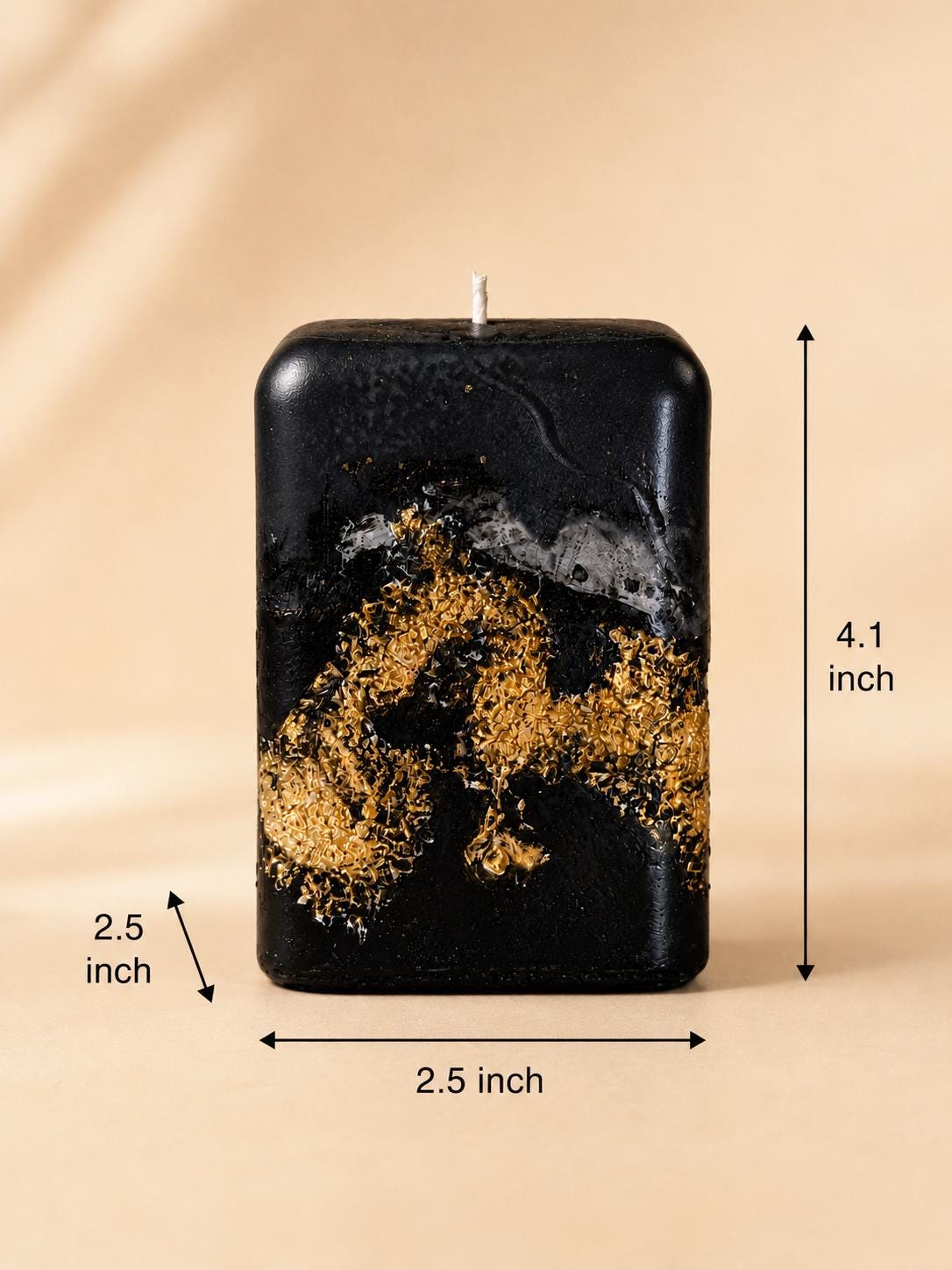 Black Gold Decorative Candle handmade luxury candle with gold leaf accents, sculptural black design, modern coffee table decor, and elegant housewarming gift styling.