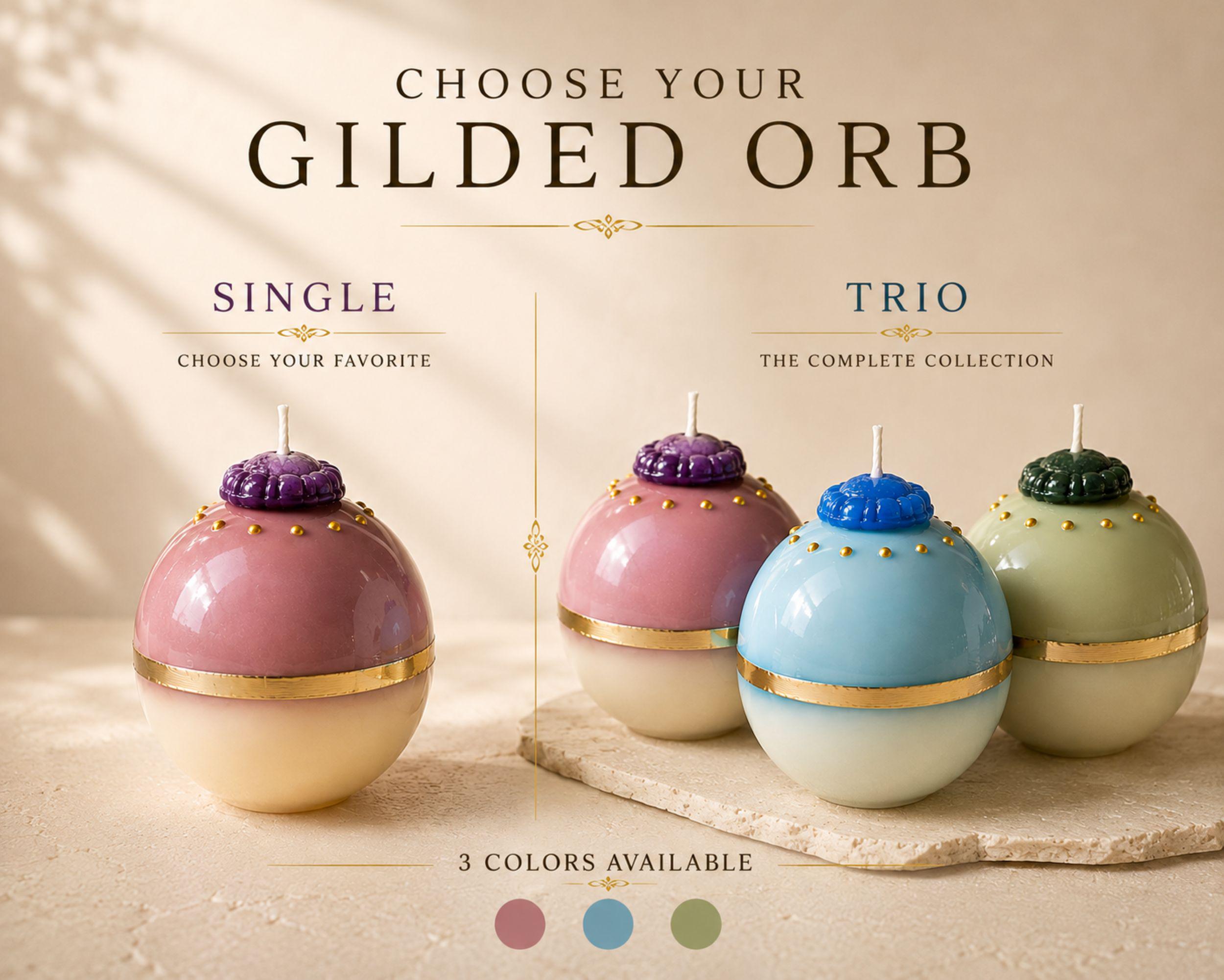 Handmade decorative sphere candle available individually or as a complete three candle set. Choose a pink, blue, or green gold accent ball candle, or select the Gilded Orb trio featuring all three colors for a unique decorative candle set and artistic home decor gift.